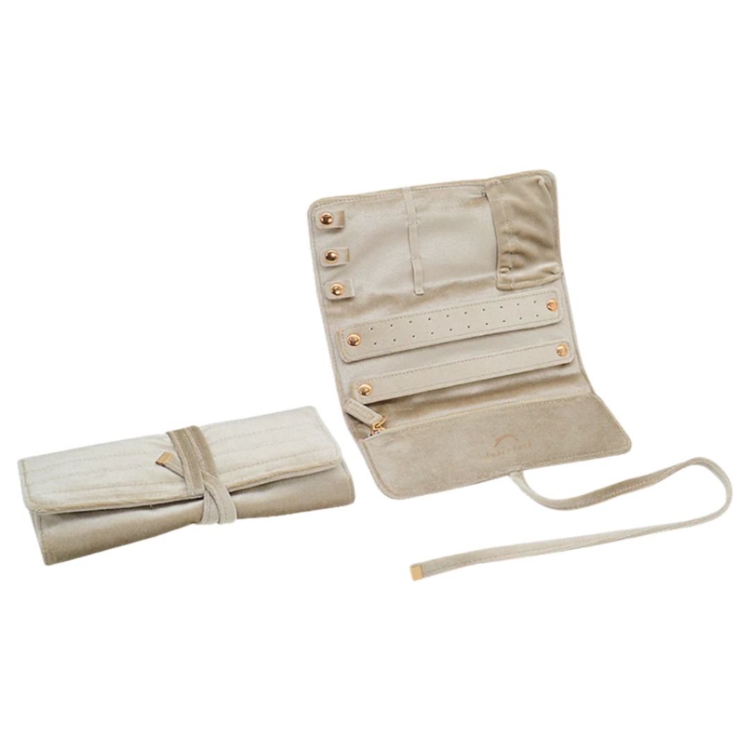 Dust and Rock Jewellery Wrap – beige foldable jewellery organiser displayed open and closed; features necklace snaps, ring bar, earring panel, zip pocket, and tie closure. Ideal travel jewellery case for keeping accessories organised and tangle-free at home or on the go.