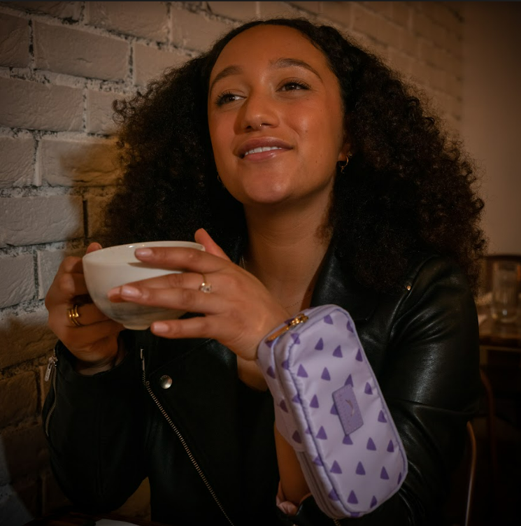 Mobile phone purse that attaches to your wrist.