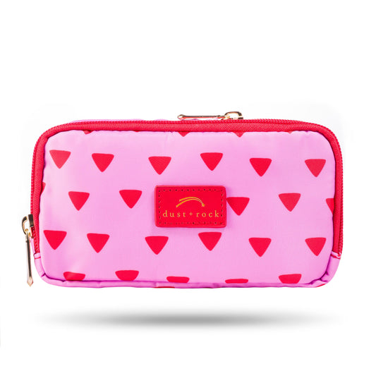 Dust and Rock Original Wrist Pocket – 'Toast My Marshmallows!' edition in bold pink with vibrant red triangle print and red trim; a standout hands-free purse perfect for festivals, travel, dog walks, and everyday adventures.